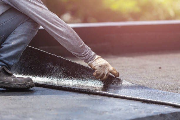 Professional Basement Waterproofing technician working in East Aurora, NY